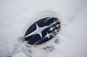 2014 Subaru XV Crosstrek Hybrid emblem in snow