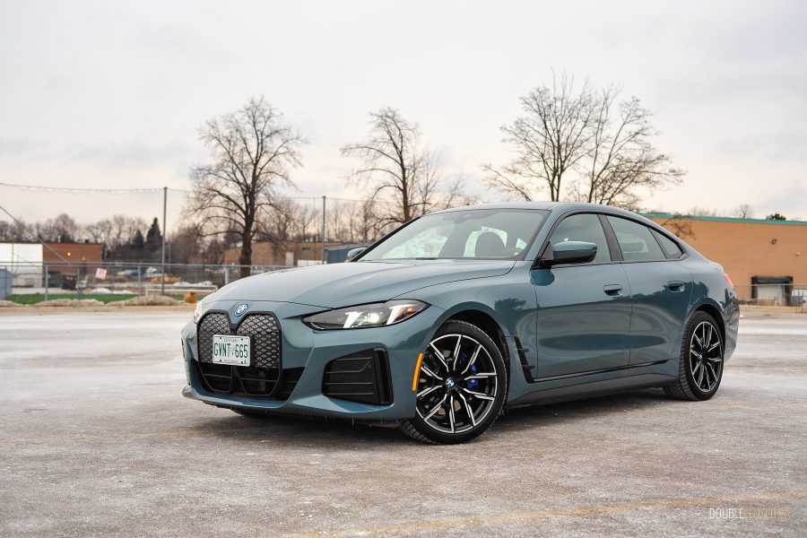 2025 BMW i4 eDrive40 in Cape York Green front three quarter view